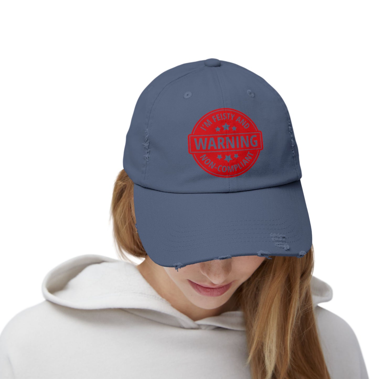 Distressed Cap — "Warning: I'm Feisty and Non-Compliant" Red Badge Hat